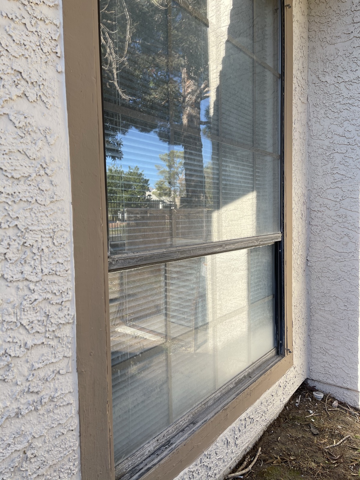 Las Vegas window coated in desert dust