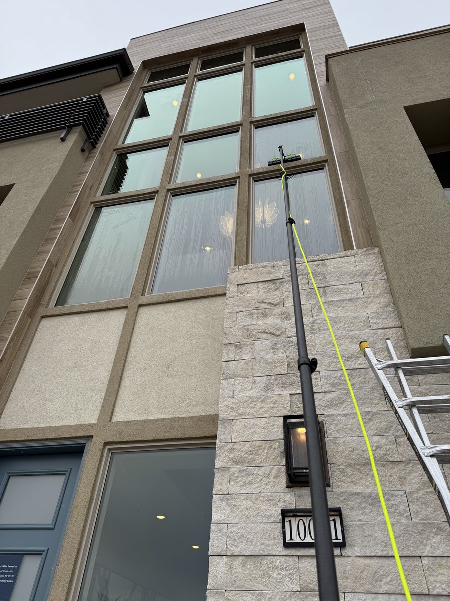 Water-fed pole reaching upper story windows on a Centennial Hills home
