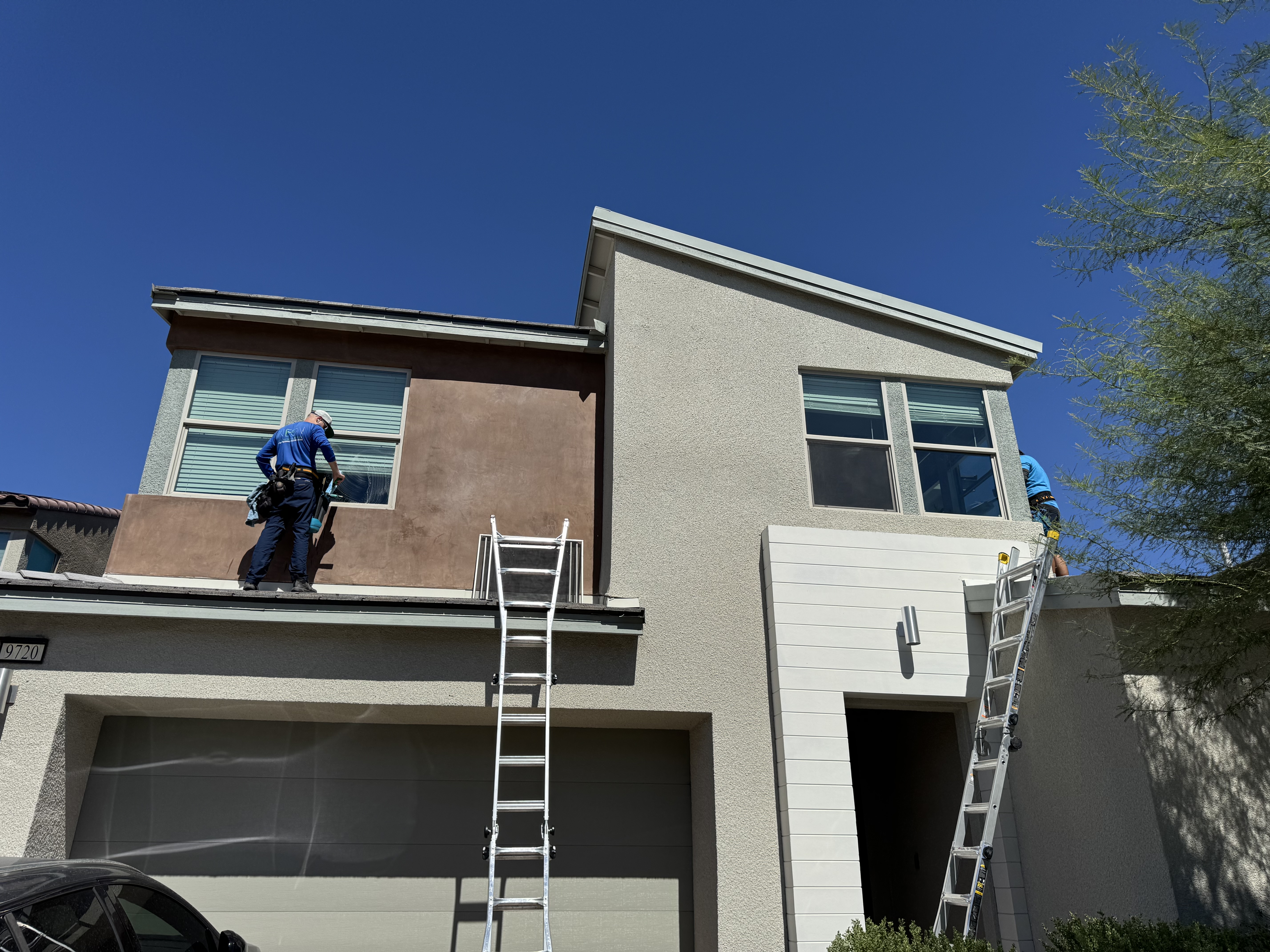 Two-story Spring Valley Las Vegas home with freshly cleaned exterior windows after professional window cleaning service